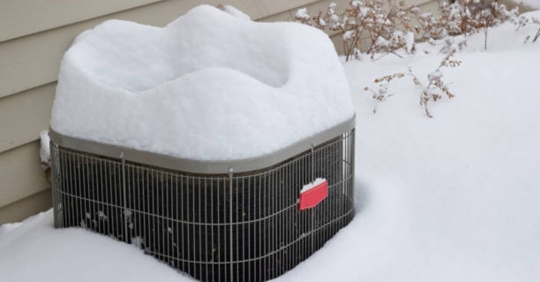 HVAC unit with snow